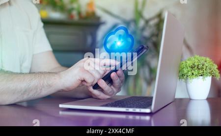 Man using smartphone with cloud computing icon. Internet technology,networking concept. Stock Photo
