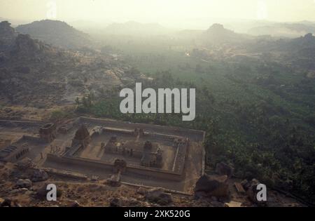 the Achyuta Raya Temple ruins from the Matanga Hill at sunrise in the town of Hampi in the Province of Karnataka in India.  India, Karnataka, March, 1 Stock Photo