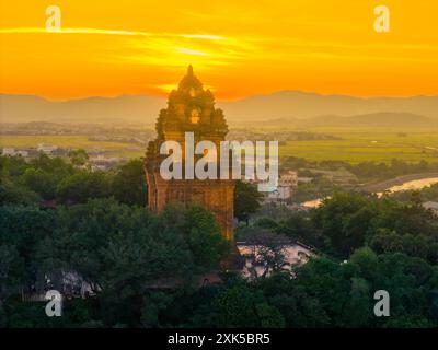 Aerial view of Nhan temple, tower is an artistic architectural work of Champa people in Tuy Hoa city, Phu Yen province, Vietnam. Sunset view. Travel a Stock Photo