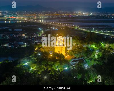 Aerial view of Nhan temple, tower is an artistic architectural work of Champa people in Tuy Hoa city, Phu Yen province, Vietnam. Night view. Travel an Stock Photo