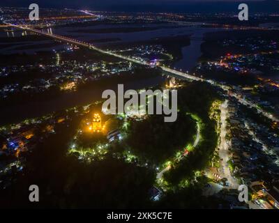 Aerial view of Nhan temple, tower is an artistic architectural work of Champa people in Tuy Hoa city, Phu Yen province, Vietnam. Night view. Travel an Stock Photo