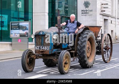 Ballymena, Northern Ireland - July 19th, 2024: Vintage Tractor Rally, Fordson Major Diesel with trailer. Concept retro, design, farming, work machine Stock Photo