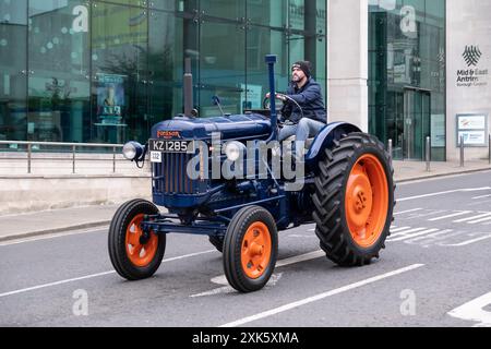 Ballymena, Northern Ireland - July 19th, 2024: Vintage Tractor Rally, gleaming blue and orange Fordson Major. Concept retro, mint, farming, vehicle Stock Photo