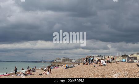 Storm clouds gather over the seafront on Brighton beach Stock Photo