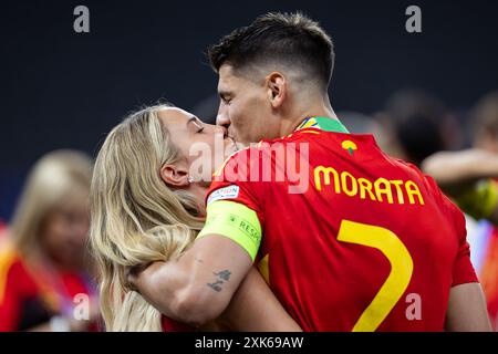 Alvaro Morata (R) of Spain kisses his wife Alice Campello-Morata (L) during the UEFA EURO 2024 final match between Spain and England at Olympiastadion Stock Photo