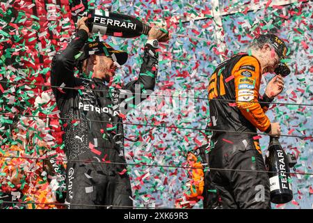 Mogyorod, Hungary. July 21st 2024. Formula 1 Hungarian Grand Prix at Hungaroring, Hungary. Pictured: Oscar Piastri (AUS) of McLaren Formula 1 Team and Lewis Hamilton (GBR) of Mercedes-AMG PETRONAS F1 Team © Piotr Zajac/Alamy Live News Stock Photo