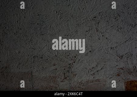 A view of an oriented strand board with white paint, as a background. Stock Photo