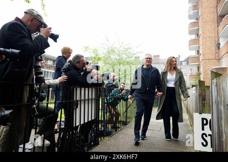 Labour Party Leader Sir Keir Starter arrives at a polling station ahead of voting this morning with wife Victoria.   (C) Belinda Jiao  07598931257 www Stock Photo