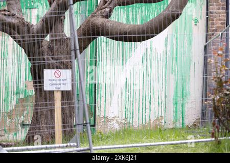 [YouKa0008307]  Banksy’s latest mural at Christie’s Court on Hornsey Road near Finsbury Park in North London has been vandalised with white paint. The Stock Photo