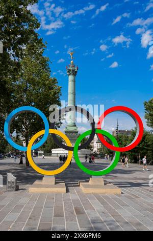 Paris, France - 07 20 2024: Olympic Games Paris 2024. View of the Bastille's Place with the July Column and the Olympic Rings Stock Photo