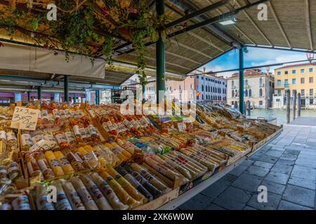 Venice, Italy - June 03, 2024: Open air food market stall with spices at the end of the day. No people in frame. Stock Photo