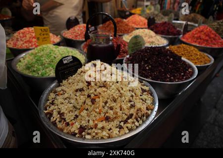 Different infusions for brewing tea each of various fruit, color and flavor, stand in the Machane Yehuda Market, Jerusalem. Stock Photo