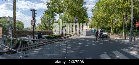 Paris, France - 07 20 2024: Olympic Games Paris 2024. View of street of Paris near the Seine and gendarmes from the sentinel operation in an armored v Stock Photo