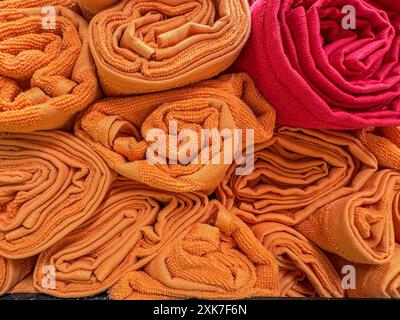 Close-up rolled colorful swim or kitchen towels Stock Photo