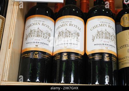 Los Angeles, California, United States - 04-06-2021: A view of several bottles of Chateau Chemin Royal 2016 Mouli-en-Medoc wine, at the store. Stock Photo