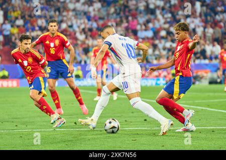 Kylian MBAPPE, FRA 10  compete for the ball, tackling, duel, header, zweikampf, action, fight against Lamine Yamal, ESP 19 Jesus Navas, ESP 22  in the semi final match  SPAIN - FRANCE 2-1 of the UEFA European Championships 2024  on Jul 9, 2024  in Munich, Germany.  Photographer: Peter Schatz Stock Photo