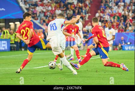 Kylian MBAPPE, FRA 10  compete for the ball, tackling, duel, header, zweikampf, action, fight against Jesus Navas, ESP 22 Nacho, ESP 4  in the semi final match  SPAIN - FRANCE 2-1 of the UEFA European Championships 2024  on Jul 9, 2024  in Munich, Germany.  Photographer: Peter Schatz Stock Photo