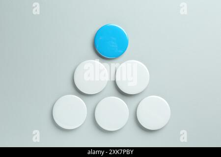 Blank button badges on light background, flat lay. Mockup for design Stock Photo