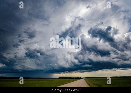 A large storm cloud with a raindrop Stock Photo