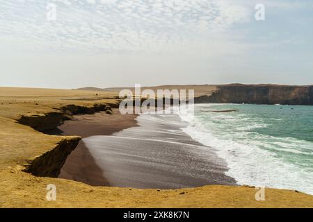 Paracas, Peru: View of the famous red sand beach, Playa Roja in spanish,  along the Pacific Ocean in Peru in south America Stock Photo