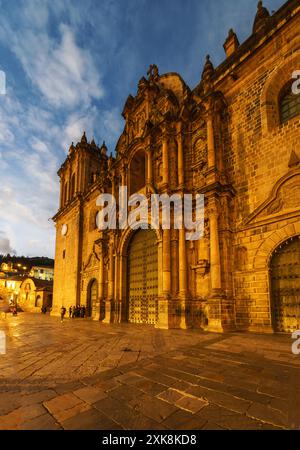 Cusco, Peru: Cusco ancient cathedral that dates from 16th centruy by the plaza de armas in Cusco old town at dusk in the Peruvian Andes Stock Photo