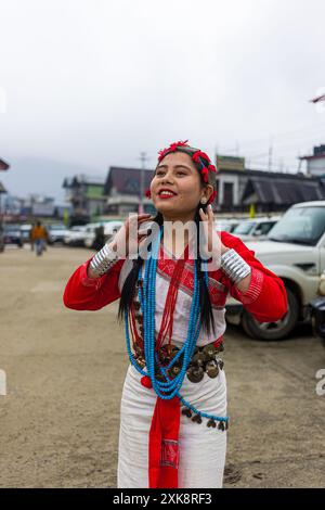 A Nyishi woman in traditional attire and jewelry, celebrating the vibrant cultural heritage of the Nyishi tribe in Arunachal Pradesh. Stock Photo