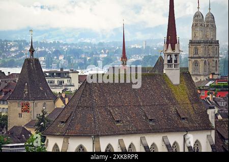 Church clock towers in Zurich Switzerland cloudy morning Stock Photo