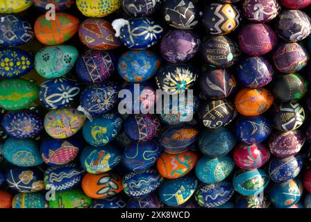 Easter eggs forming a shape on snow Stock Photo