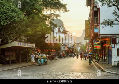 Scenic view of a street in Yangshuo County at sunset Stock Photo