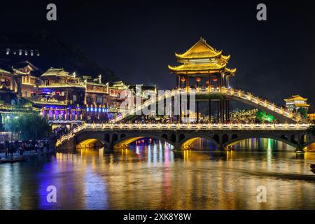 Wonderful night view of scenic bridge in Phoenix Ancient Town Stock Photo