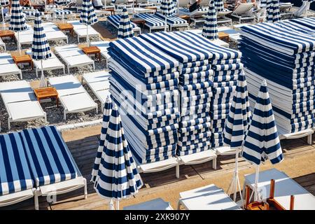 Nice, France - May 25, 2024: Beach in the center of Nice at sunset Stock Photo