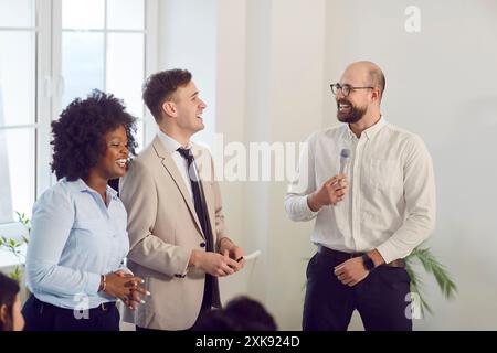 Colleagues Having A Productive And Joyful Office Meeting Stock Photo