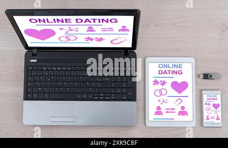 Online dating concept shown on different information technology devices Stock Photo