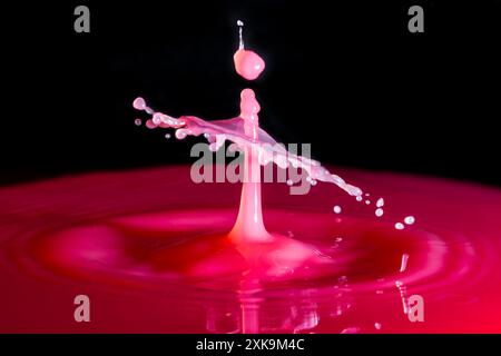 Beautiful splash art water droplet photography in a blood red colour. Good for living room art. Stock Photo