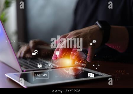 Chat with AI or Artificial Intelligence. Young businessman chatting with a smart AI or artificial intelligence using an artificial intelligence chatbo Stock Photo