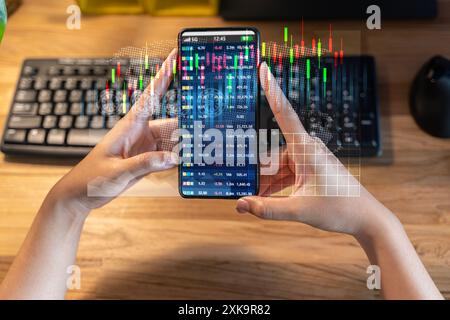 Businesspeople press the phone to communicate in the Internet Stock chart Researching process.Business working startup modern office Laptop global str Stock Photo