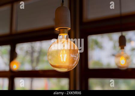 Retro luxury interior light lamp for home lighting decor. Illuminated. glowing LED lamps in the interior. Modern wire ceiling lights. Art nouveau styl Stock Photo