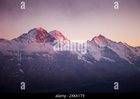 Mountain peaks of Eiger, Monch and Jungfrau in Swiss Alps seen from Faulhorn, Bernese Oberland, Bern Canton, Switzerland Stock Photo