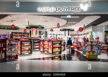 Customers Shopping At The World Duty Free Shop, London Gatwick North Terminal, Crawley, Sussex, UK. Stock Photo