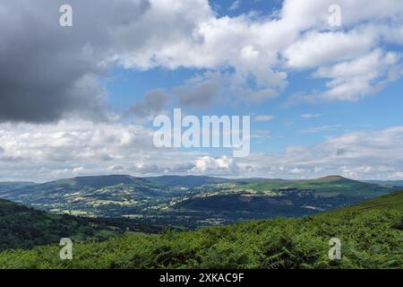 View across the Usk Valley to Sugarloaf Mountain and the Brecon Beacons National Park (Bannau Brycheiniog) from Blaenavon Mountain, Monmouthshire Stock Photo