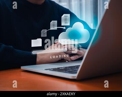 Data transfer service, file migration, backup files concept. Document from folder moving to cloud storage with loading progress bar on laptop computer Stock Photo