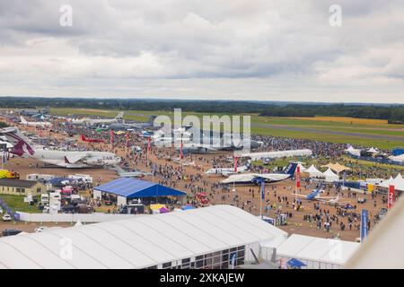 Fairford, UK. 21 JUL, 2024. Ariel view as thousands decended on the Royal International Air Tattoo (RIAT), one of the worlds largest airshows with over 200 planes on the USAF RAF Fairford site with multiple flying displays. Credit Milo Chandler/Alamy Live News Stock Photo