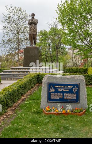 Indian guru Sri Chinmoy. Prayer for peace. Ganapati Kumar Ghose. Monument. Ukraine, Kyiv - April 15, 2024. Stock Photo