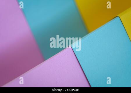 Pastel colored and folded paper Stock Photo