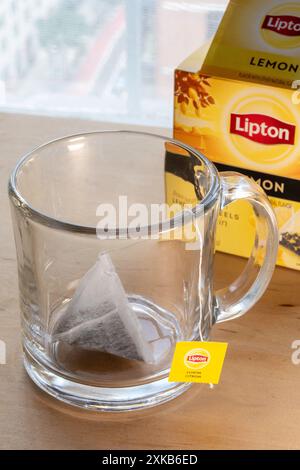 Clear Glass Mug with Lipton pyramid teabag, USA Stock Photo