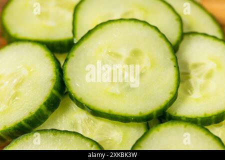 Cold Organic Green Cucumber Slices Ready to Eat Stock Photo