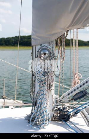 close up of ropes and pulley on the mast of a sailing yacht Stock Photo