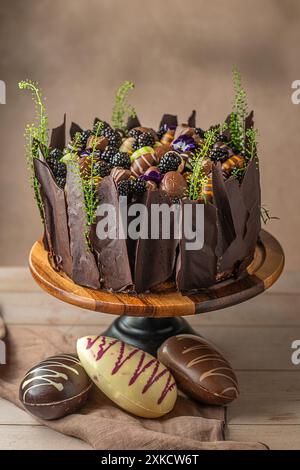 Easter chocolate cake. Beautifully decorated on the table with easter eggs. Stock Photo