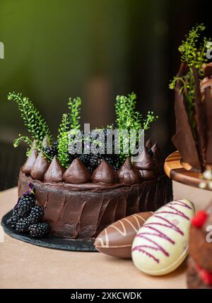 Easter chocolate cake. Beautifully decorated on the table with easter eggs. Stock Photo