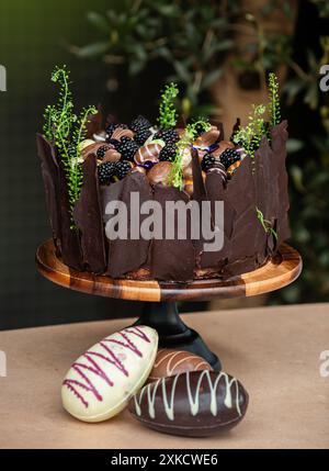 Easter chocolate cake. Beautifully decorated on the table with easter eggs. Stock Photo